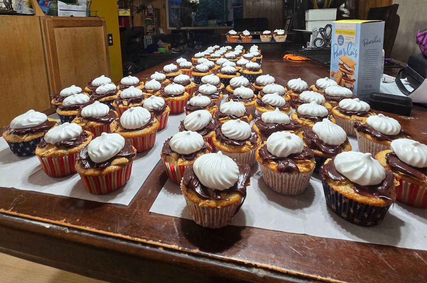 Trays of s'mores cupcakes with toasted marshmallow